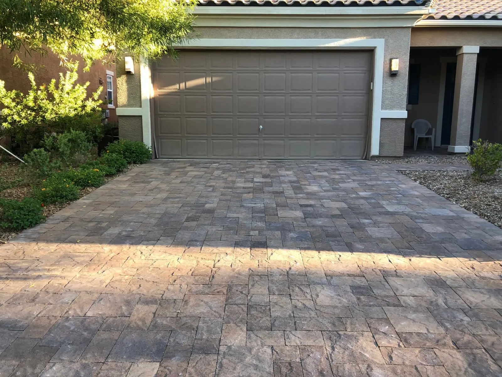 Paver driveway in Las Vegas framed by crisp soldier-course edging