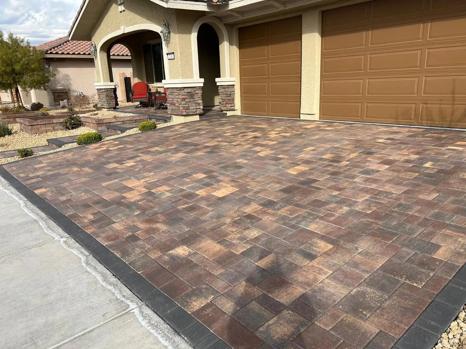 Paver driveway in Las Vegas replacing worn concrete with interlocking pavers