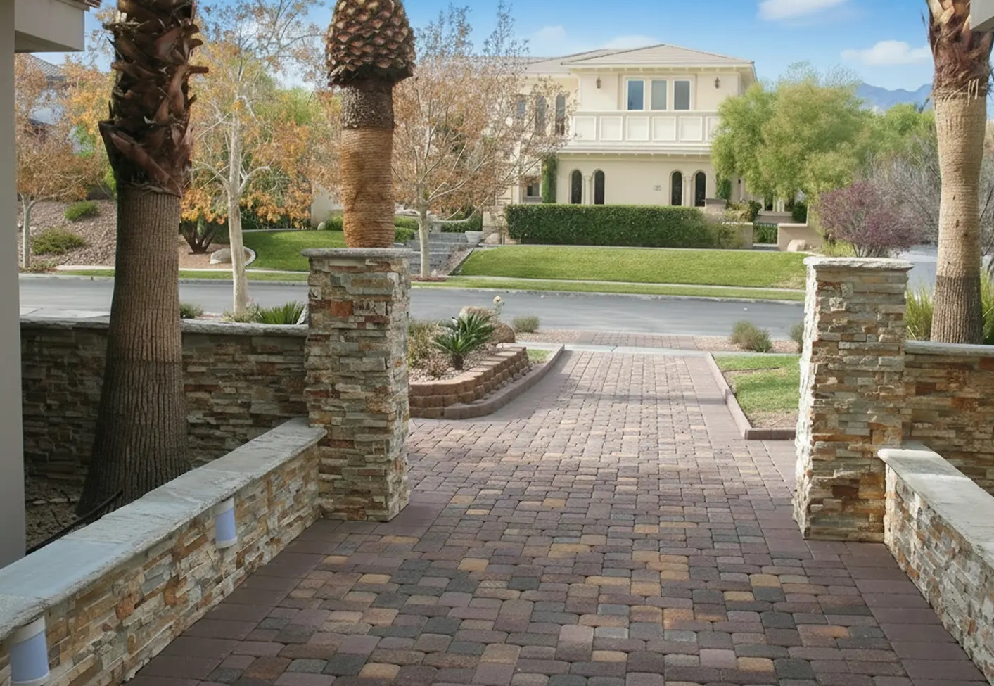 Paver entryway in Las Vegas framed by desert landscaping