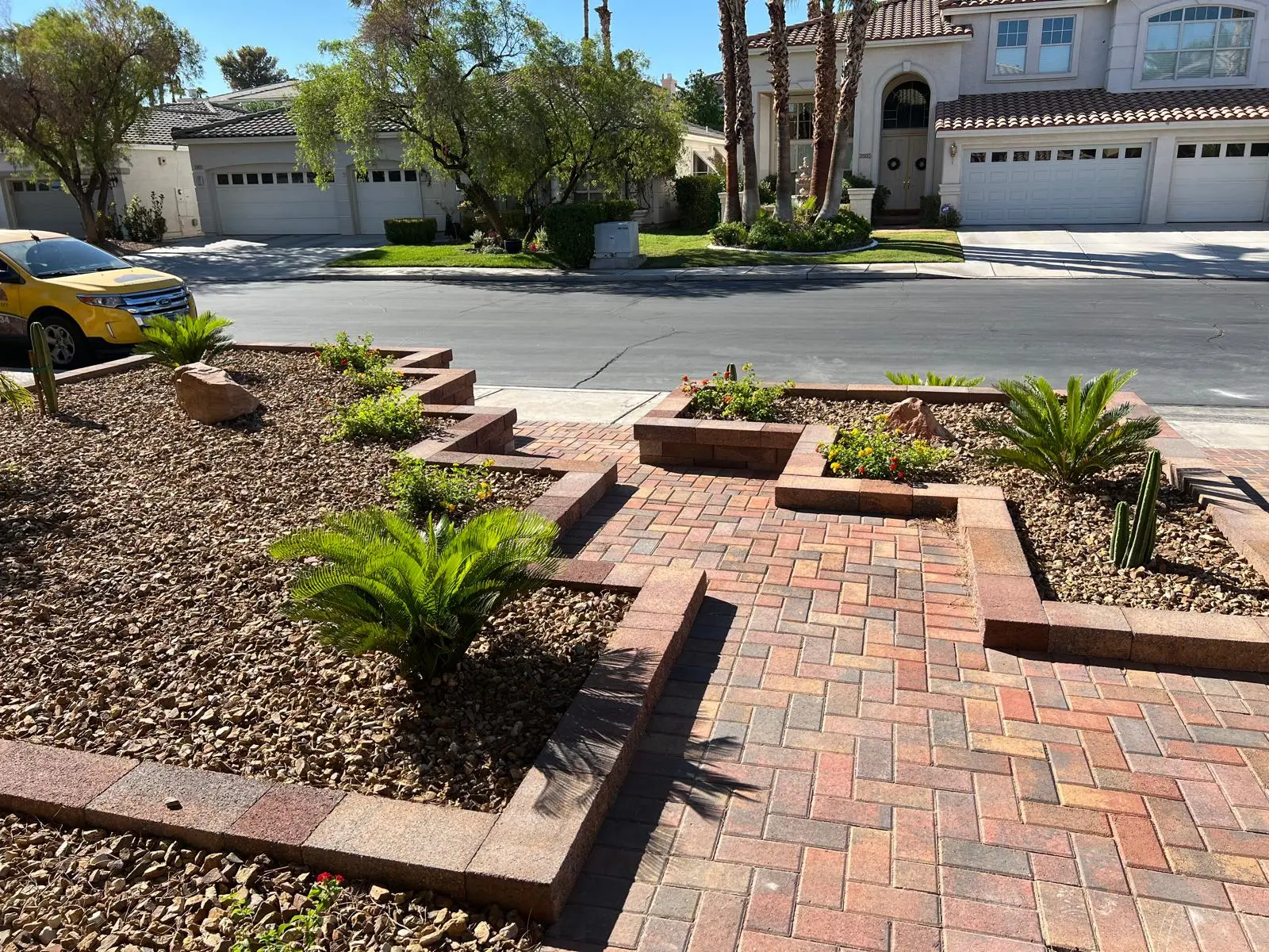 Paver entryway in Las Vegas leading to a covered front porch