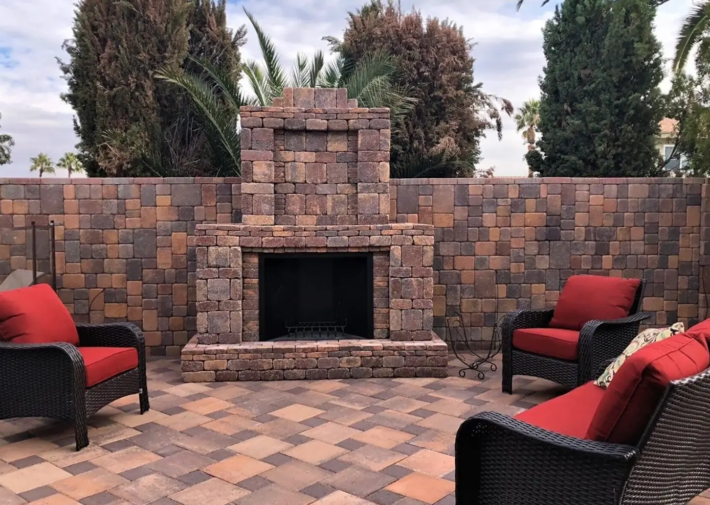 Paver fire pit & fireplace in Las Vegas as a cozy backyard gathering spot