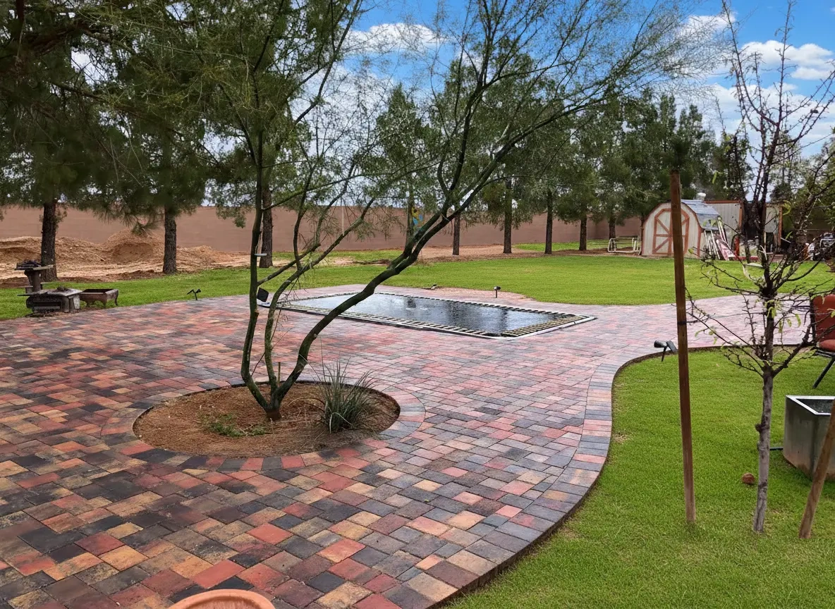 Paver patio in Las Vegas paired with lush desert landscaping