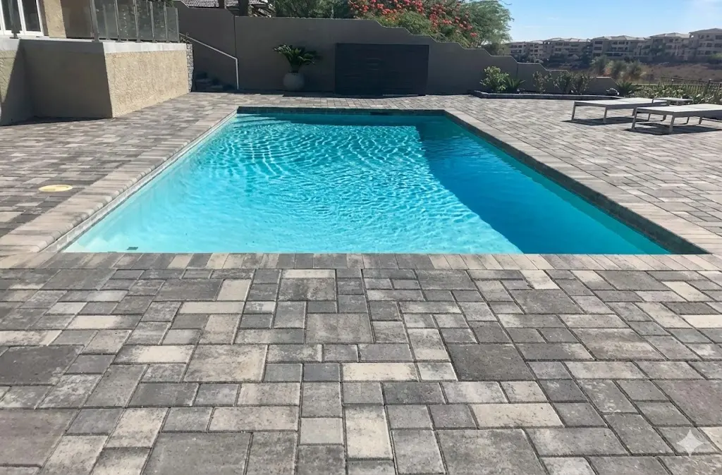 Paver pool deck in Las Vegas framing a sparkling rectangular pool