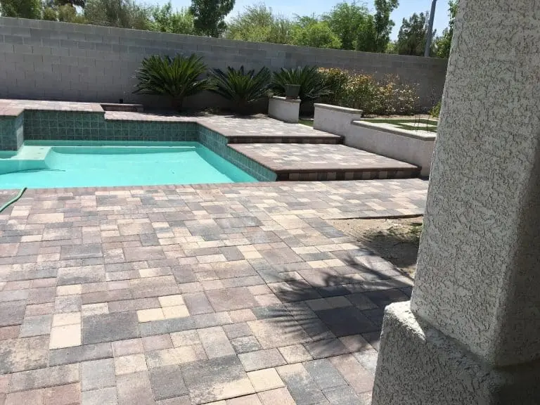 Paver pool deck in Las Vegas with a clean modern paver border
