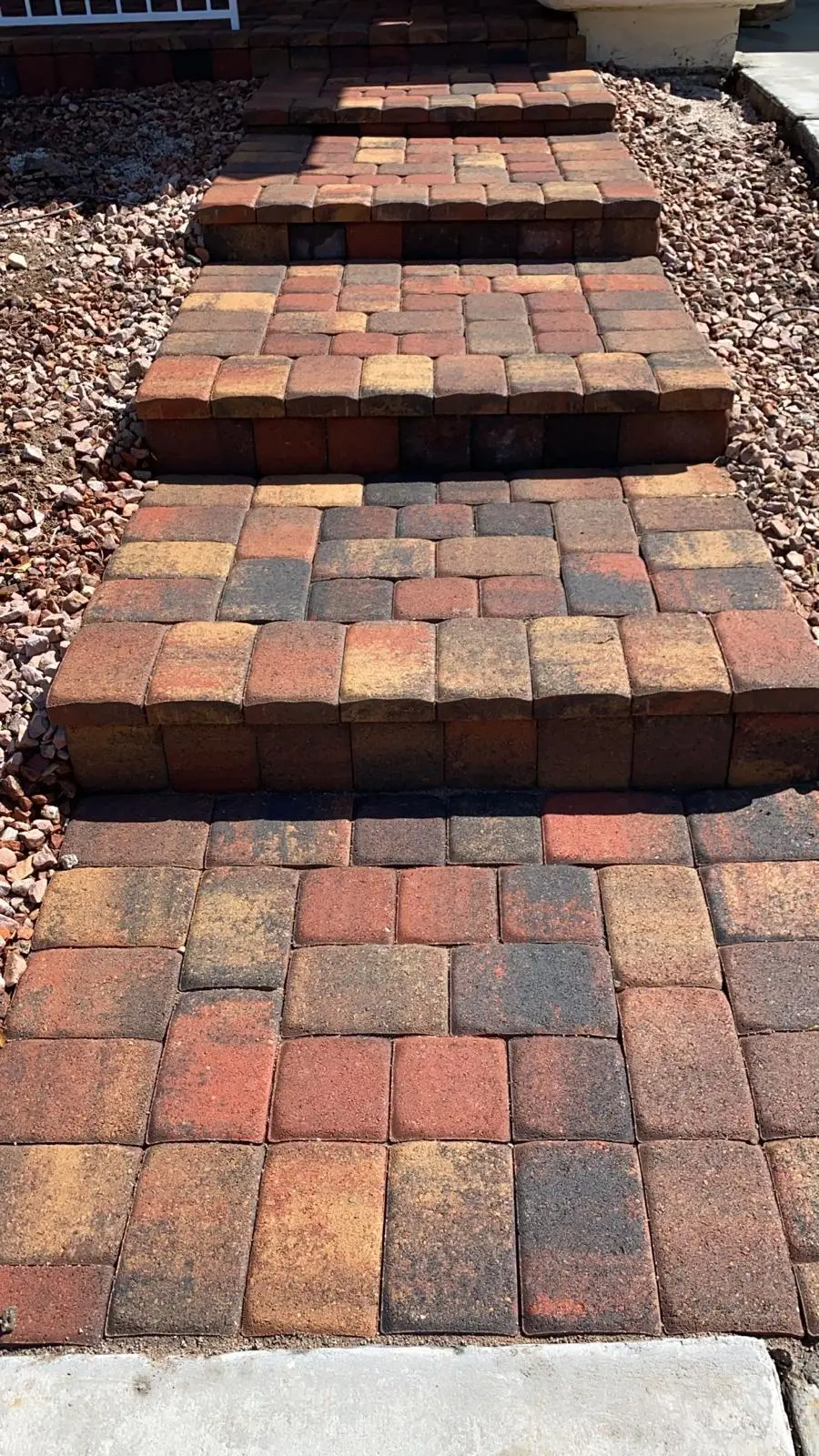 Paver steps in Las Vegas built into a landscaped slope