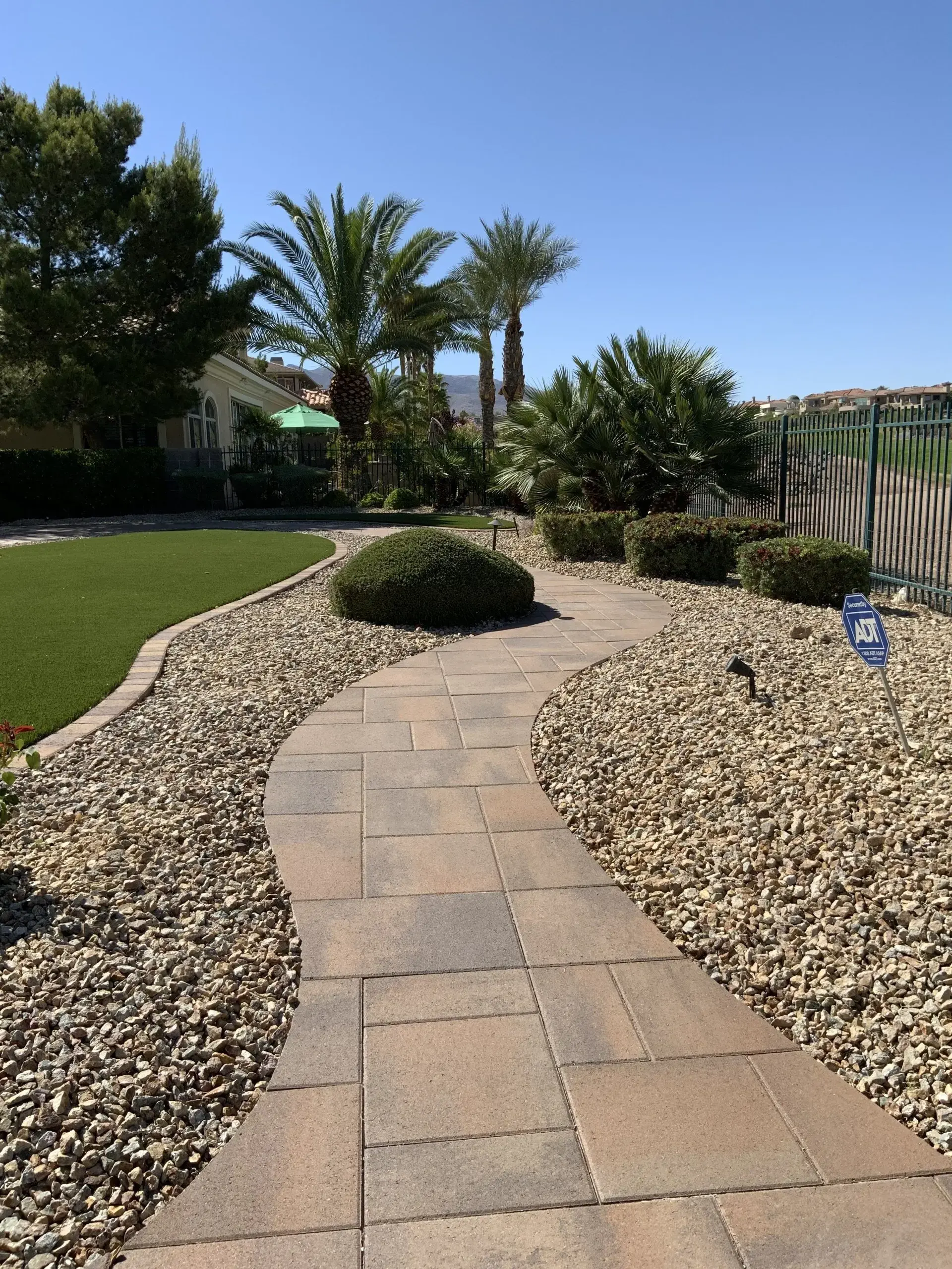 Paver walkway in Las Vegas connecting the driveway to the front door
